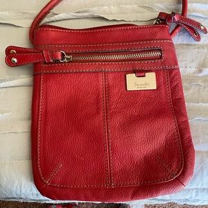 Red leather Tignanello several zippered pockets purse